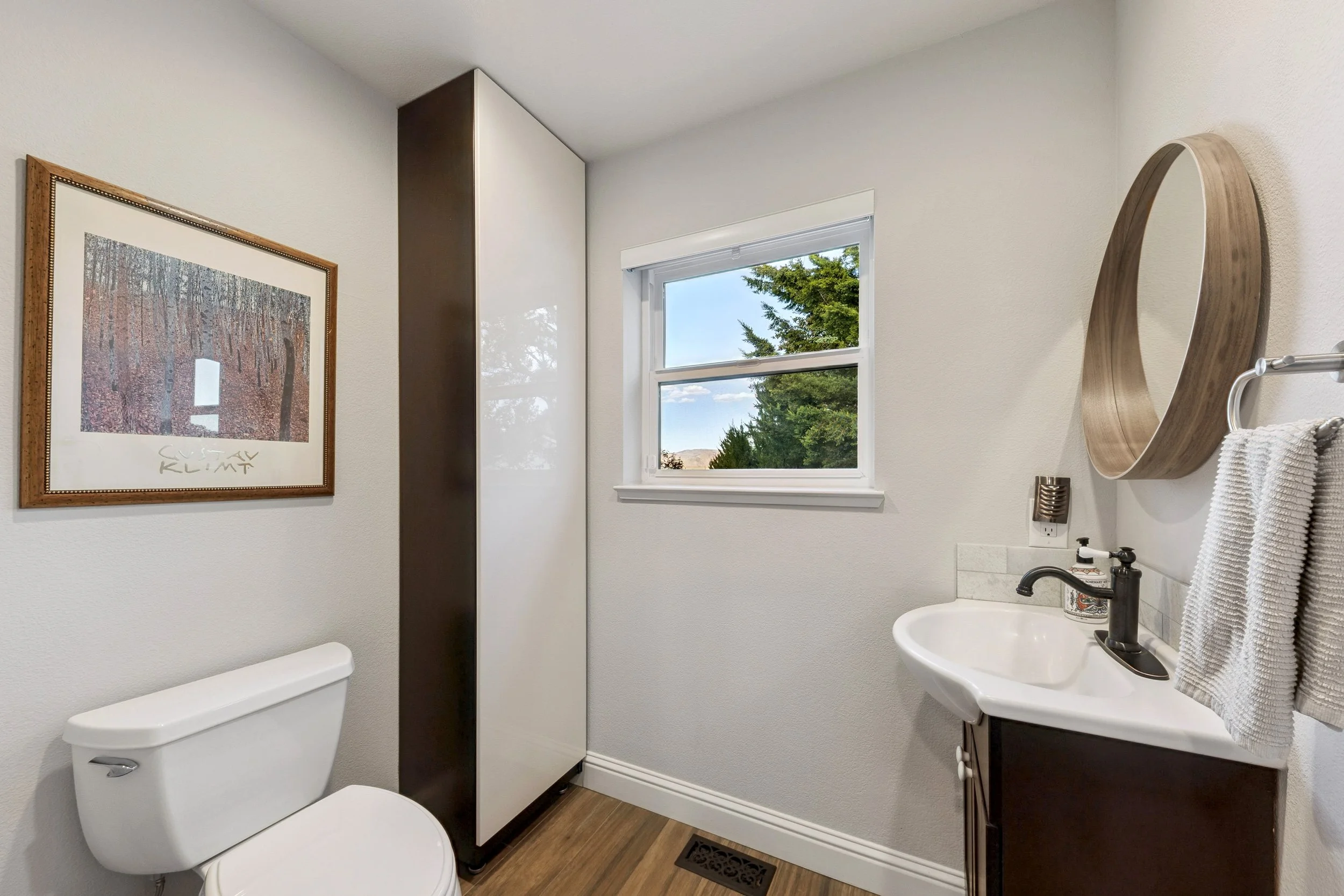 canopy-real-estate-2425-killington-drive-half-bathroom-downstairs.jpg