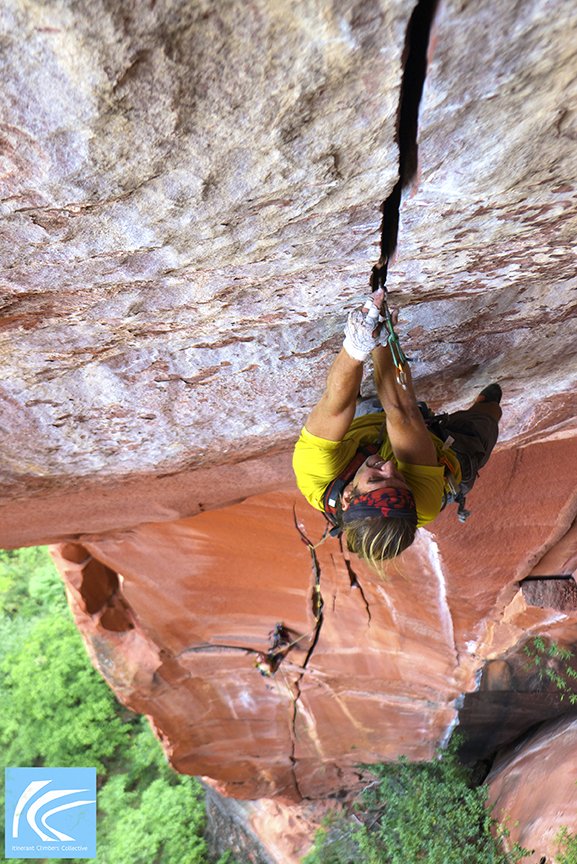 Mike Dobie climbs the iconic overhanging ringlock crack, The Great Firewall (5.13d) at the Cretaceous Area in Liming, China