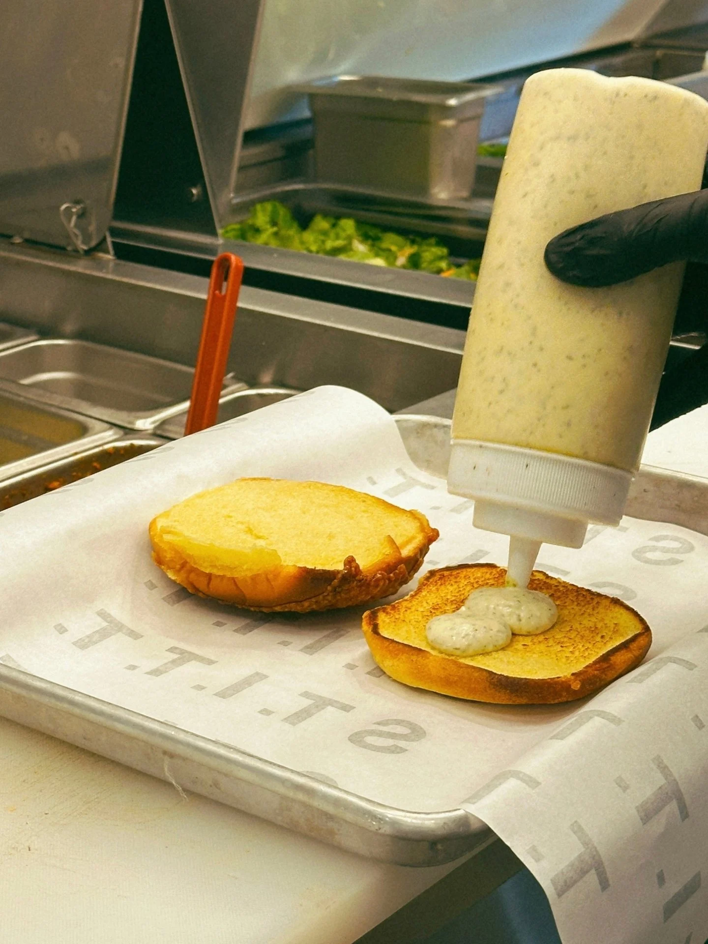 The secret weapon - our housemade garlic &amp; herb aioli. A crowd favorite.