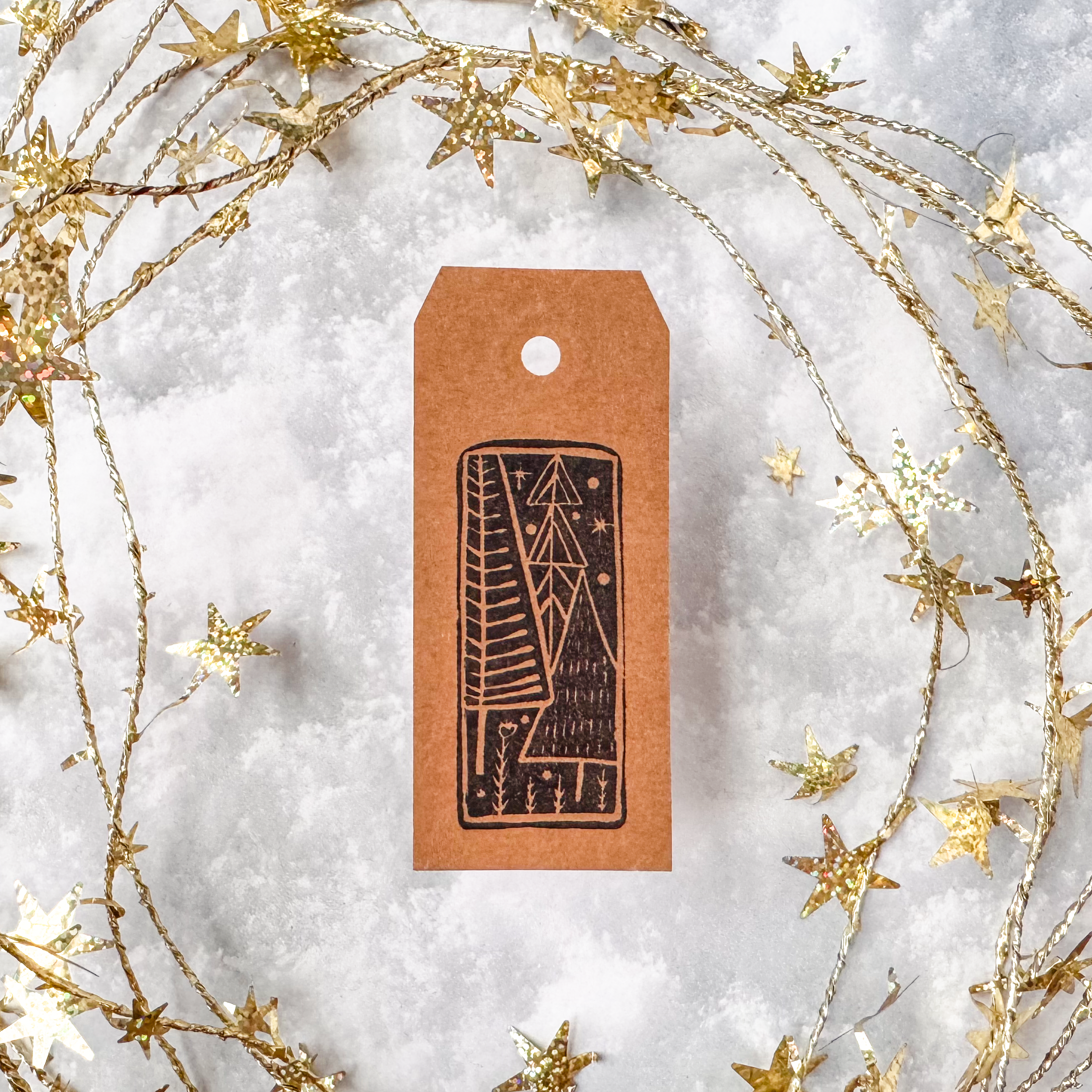 Stylized Nordic evergreen trees in a simple, modern design