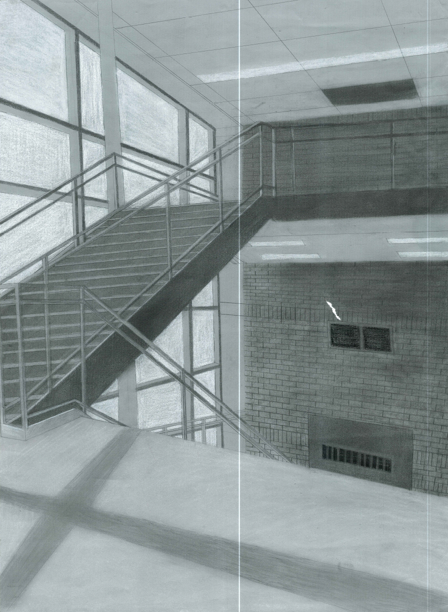 Interior view of a school or office building with brick walls, large windows, and metal stairs and railings.