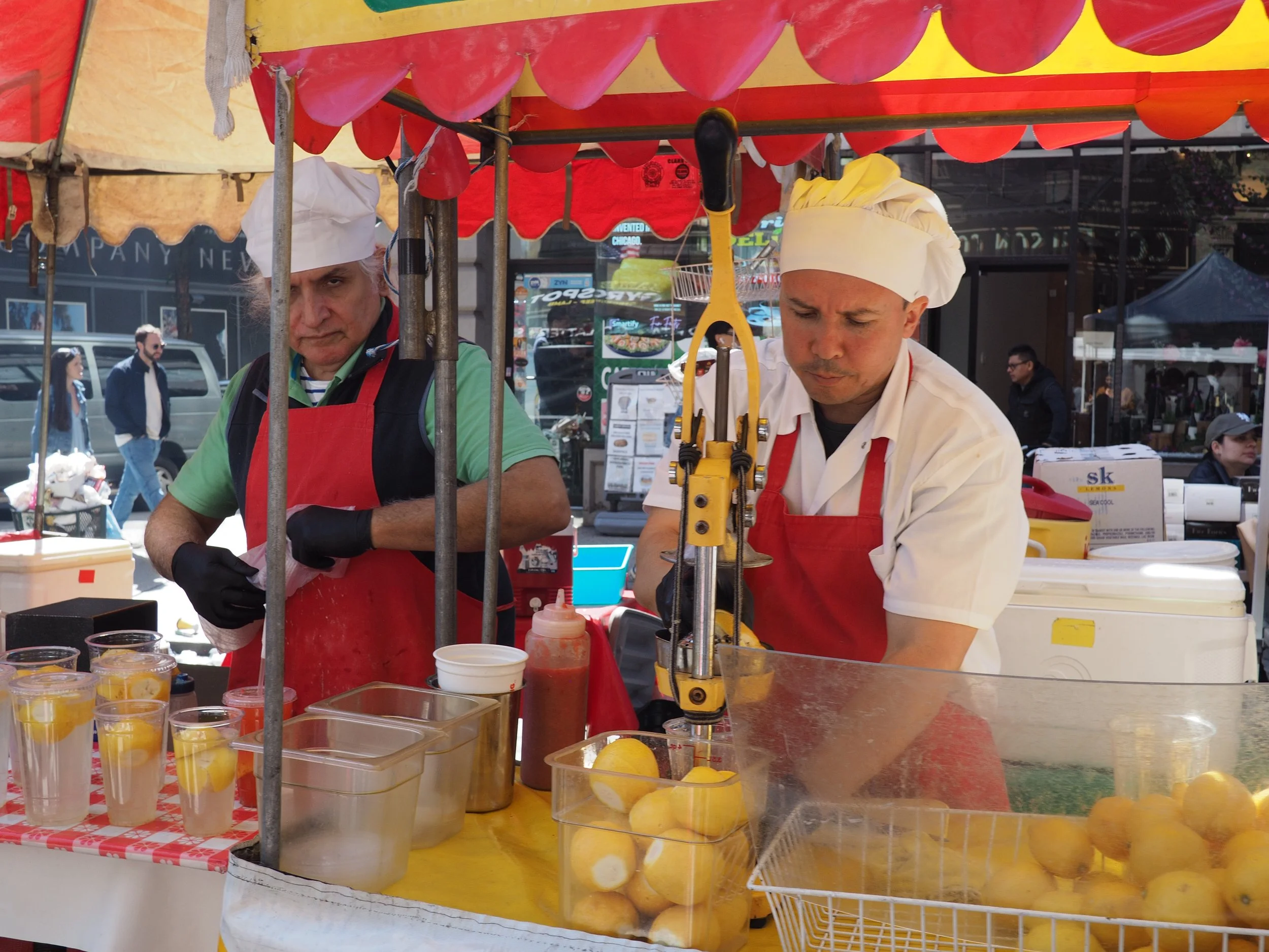New York, NY--Men make fresh lemonade to sell at Japan Fest.
