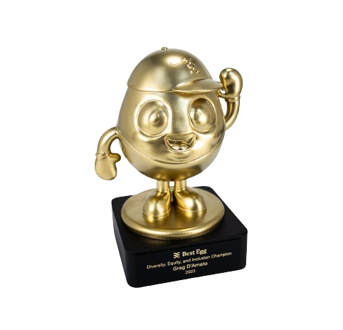 Gold-colored cartoon-style egg character with a cap, standing on a black award base, saluting with its right hand.