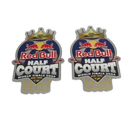 Two championship medals with Red Bull Half Court World Finals 2024 New York logos, crown and basketball design.
