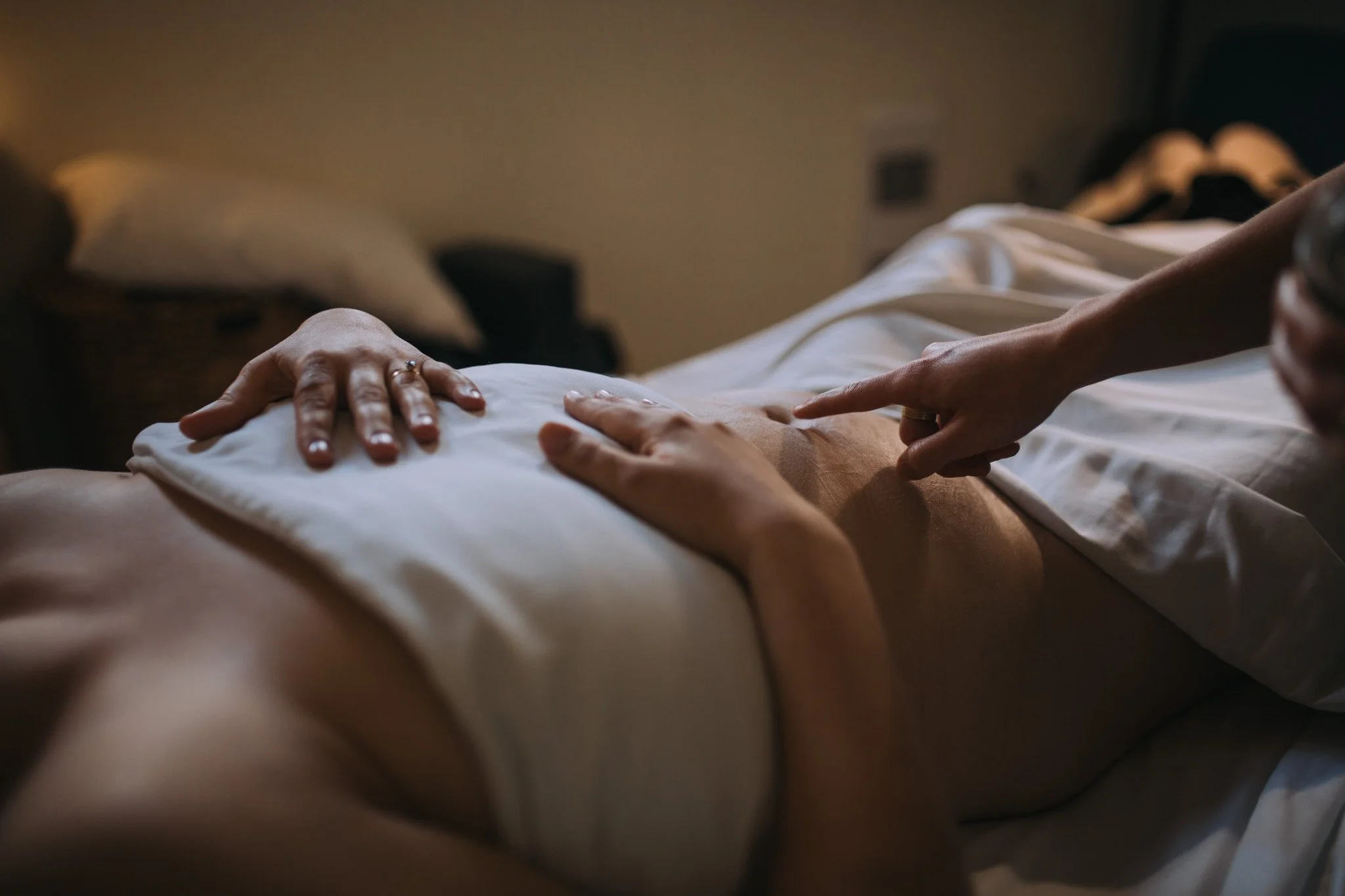 registered acupuncturist providing post c-section scar tissue cupping treatment