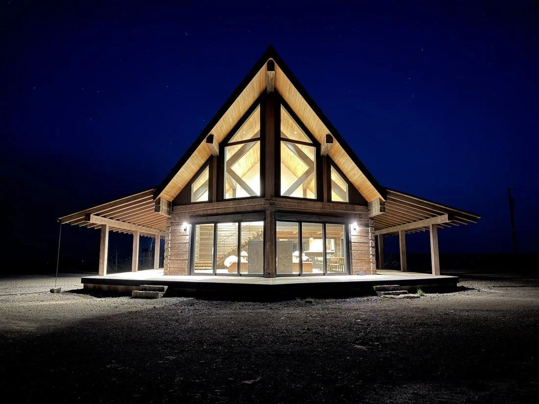 Reed Retreat main residence glowing at night