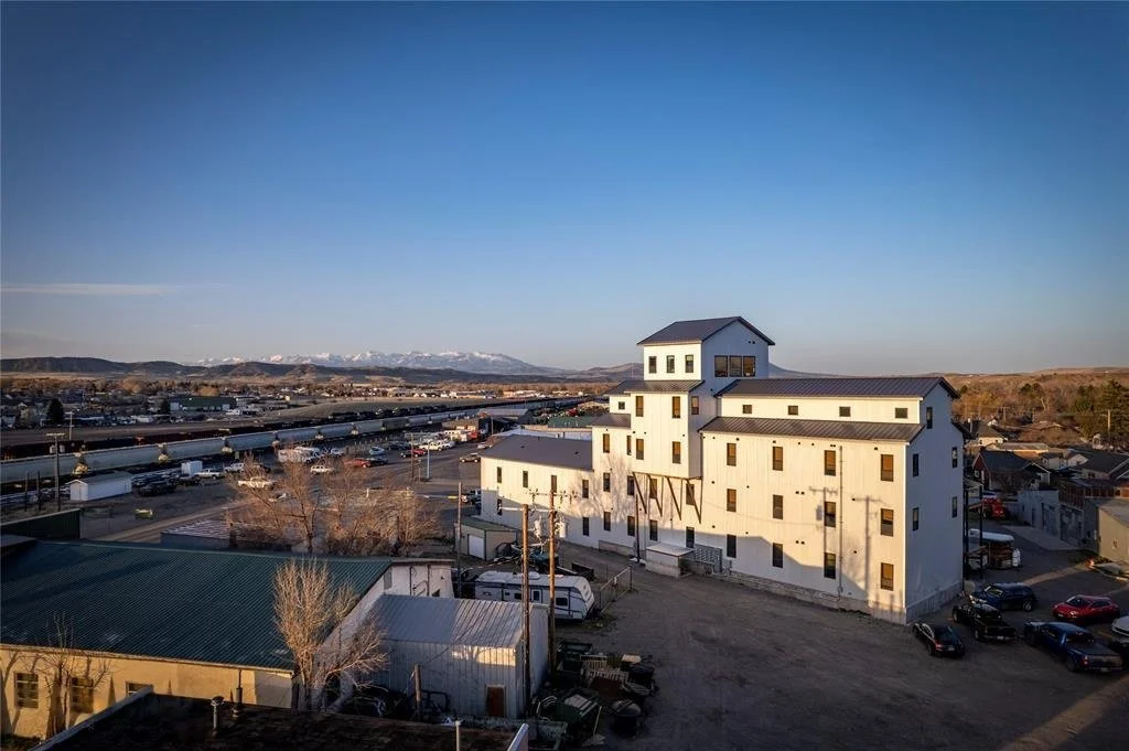 Aerial view of The Granary, a historic grain elevator converted to apartments in Livingston, Montana