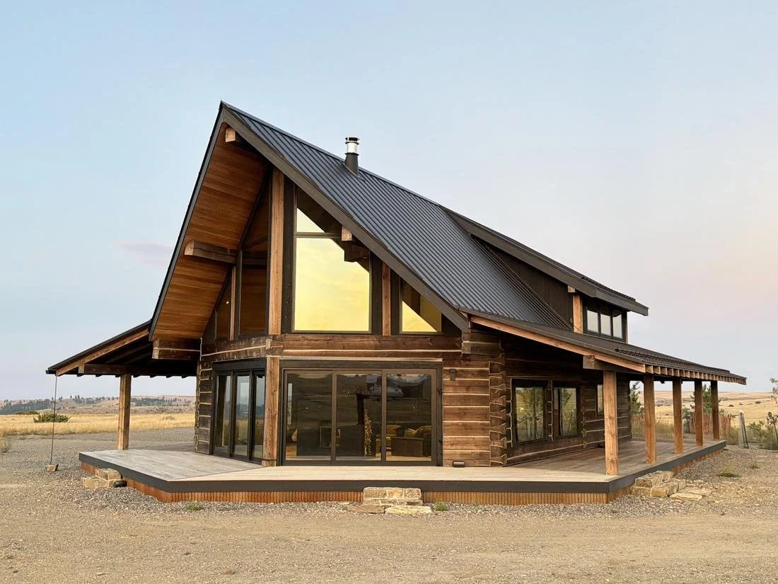 Reed Retreat main residence with heavy timber and glass, Reed Point, Montana
