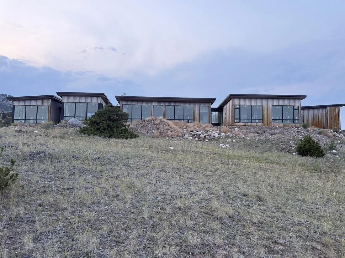 Stepped volumes of the Paradise View home along the slope