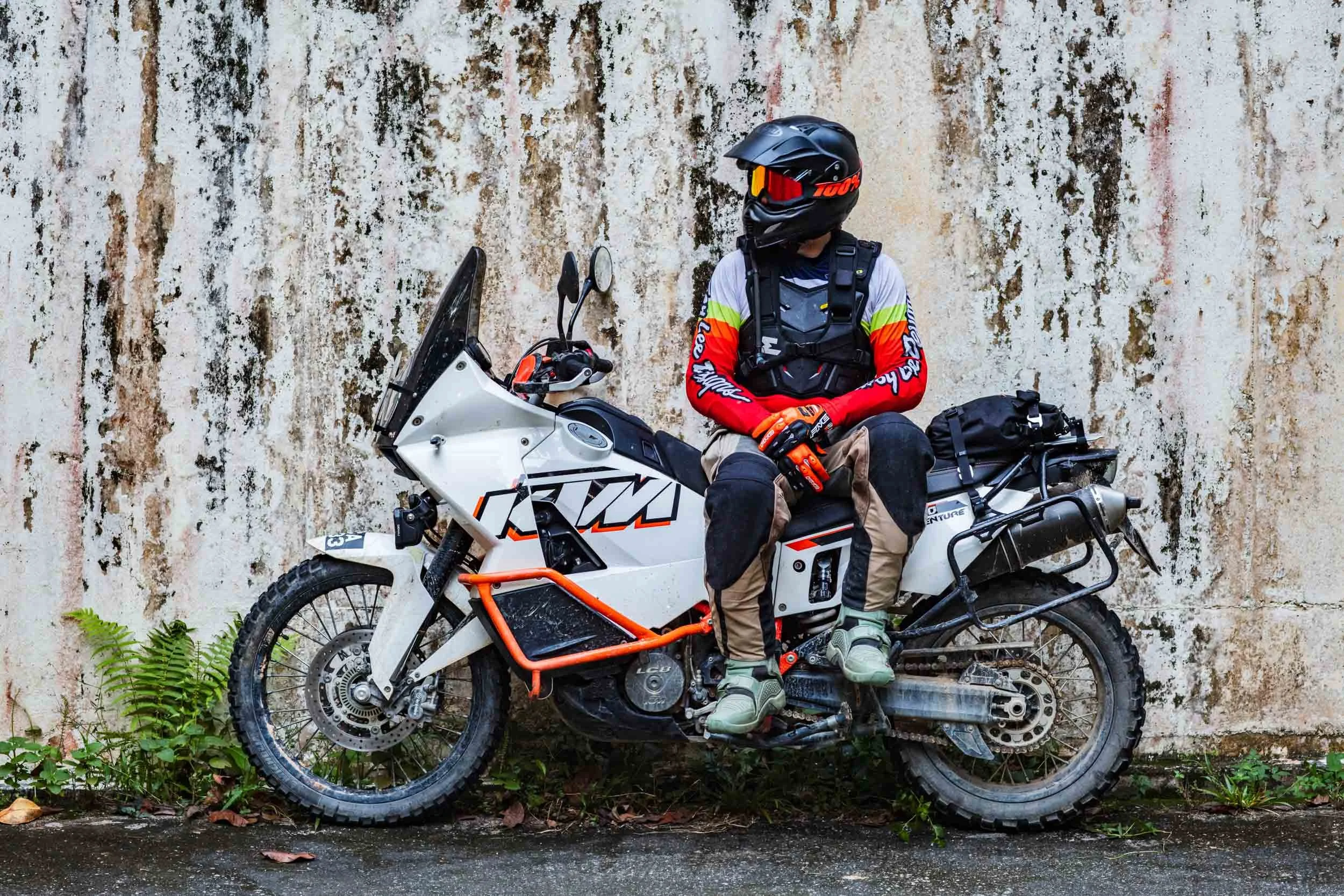 Malaysia based motorcycle photographer Richard Humphries, aka Cheeky Moto, pictured here with his trusty KTM 990 Adventure.