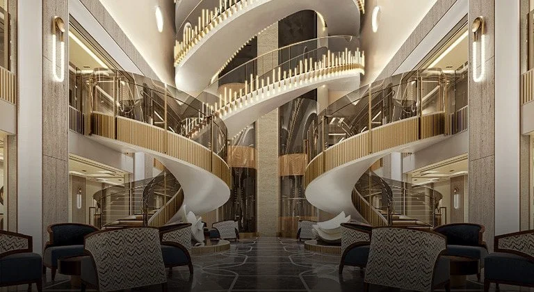 Luxurious hotel lobby with a spiral staircase, modern furniture, and elegant lighting