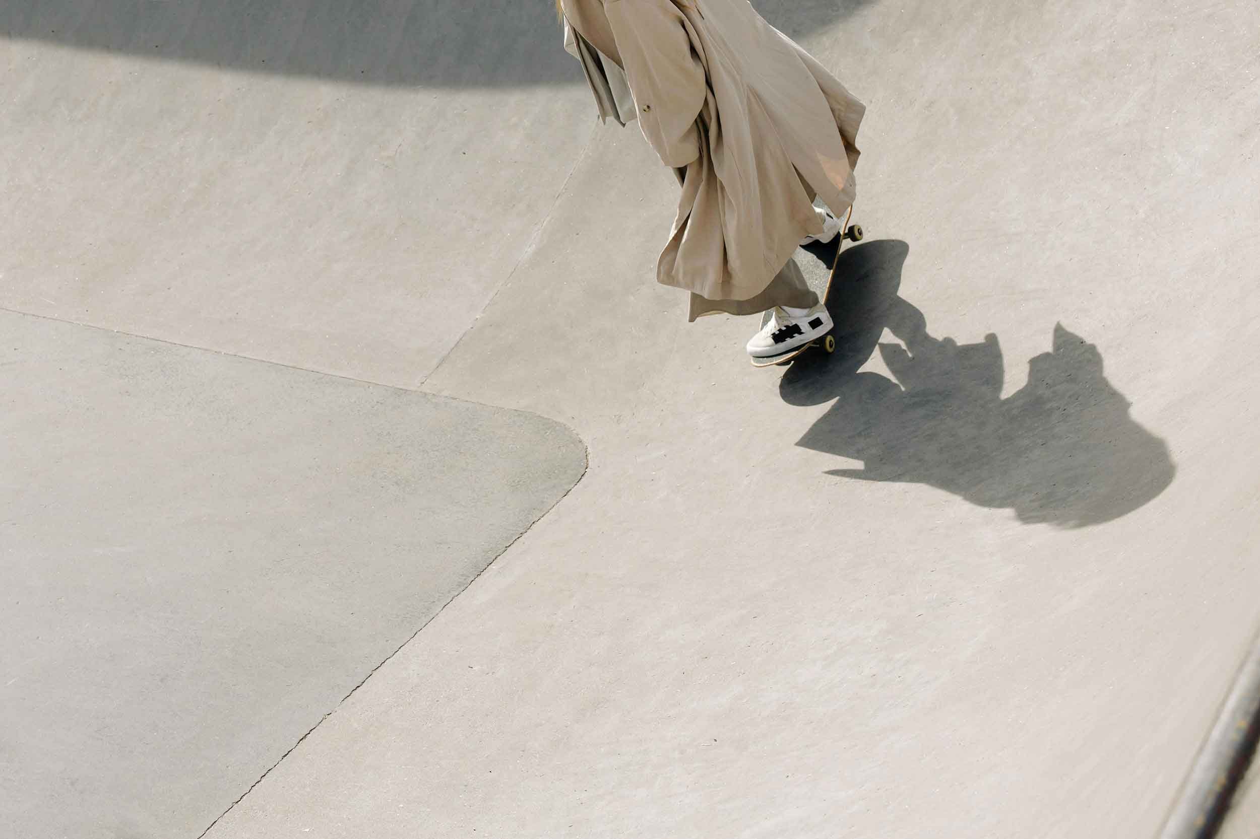 A person with a skateboard making a turn