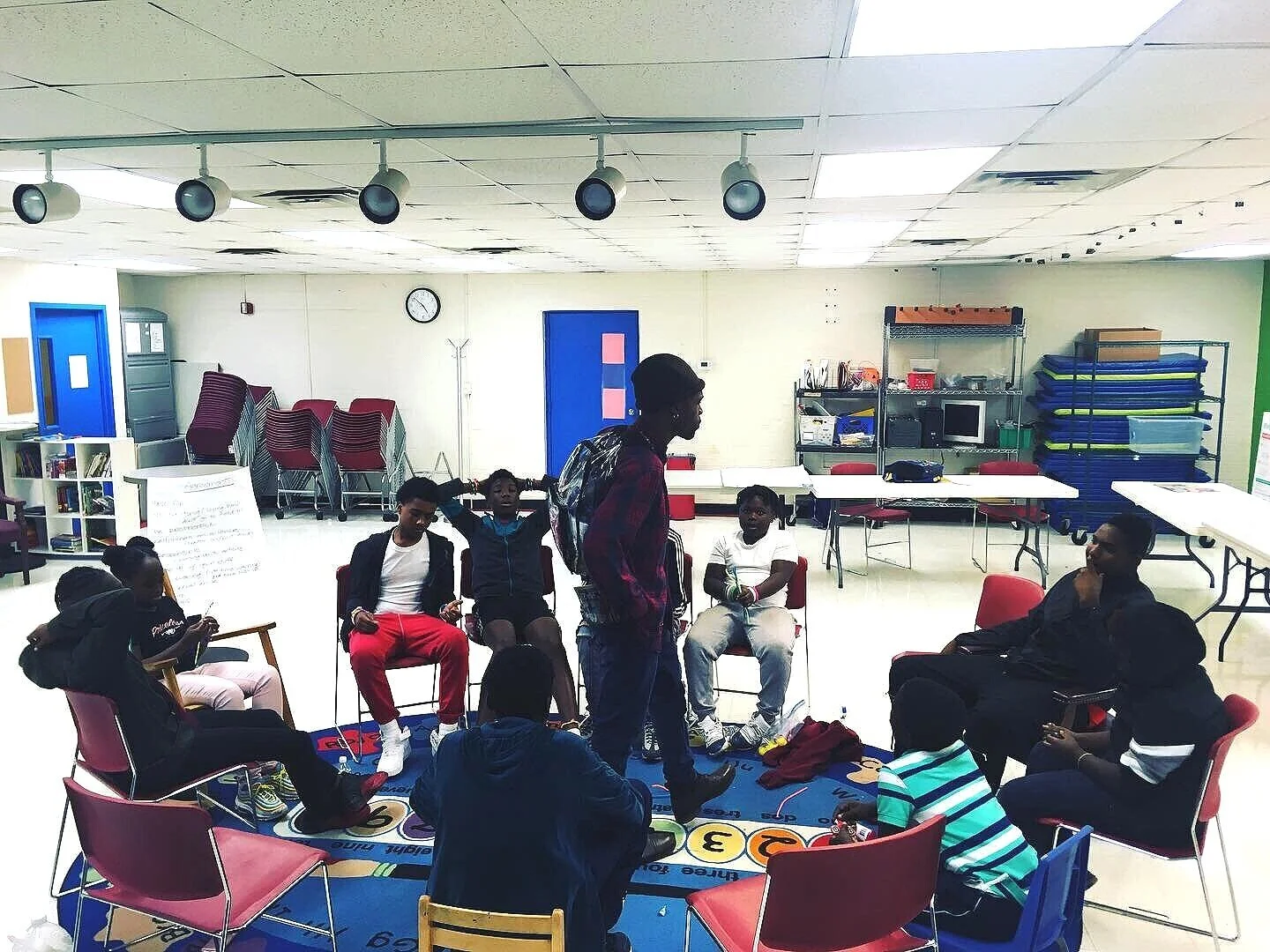 youth-led conflict transformation circle, facilitated by Brandon Lovee, Zenobia Bey, and Cristina Leoni-Osion
