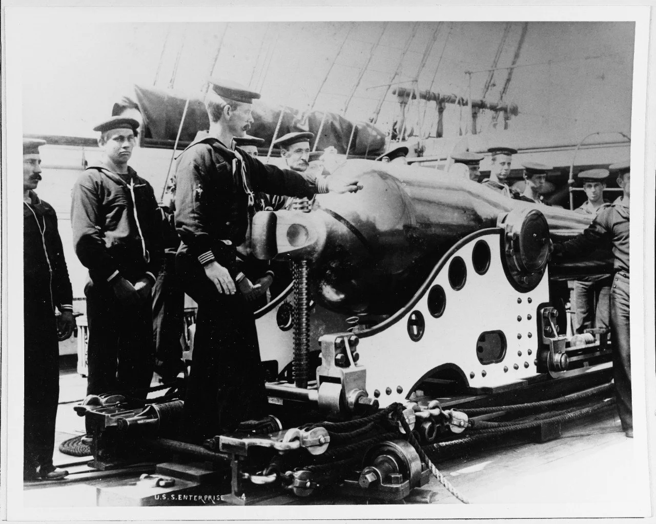 8-Inch Rifle of USS Enterprise along with several sailors