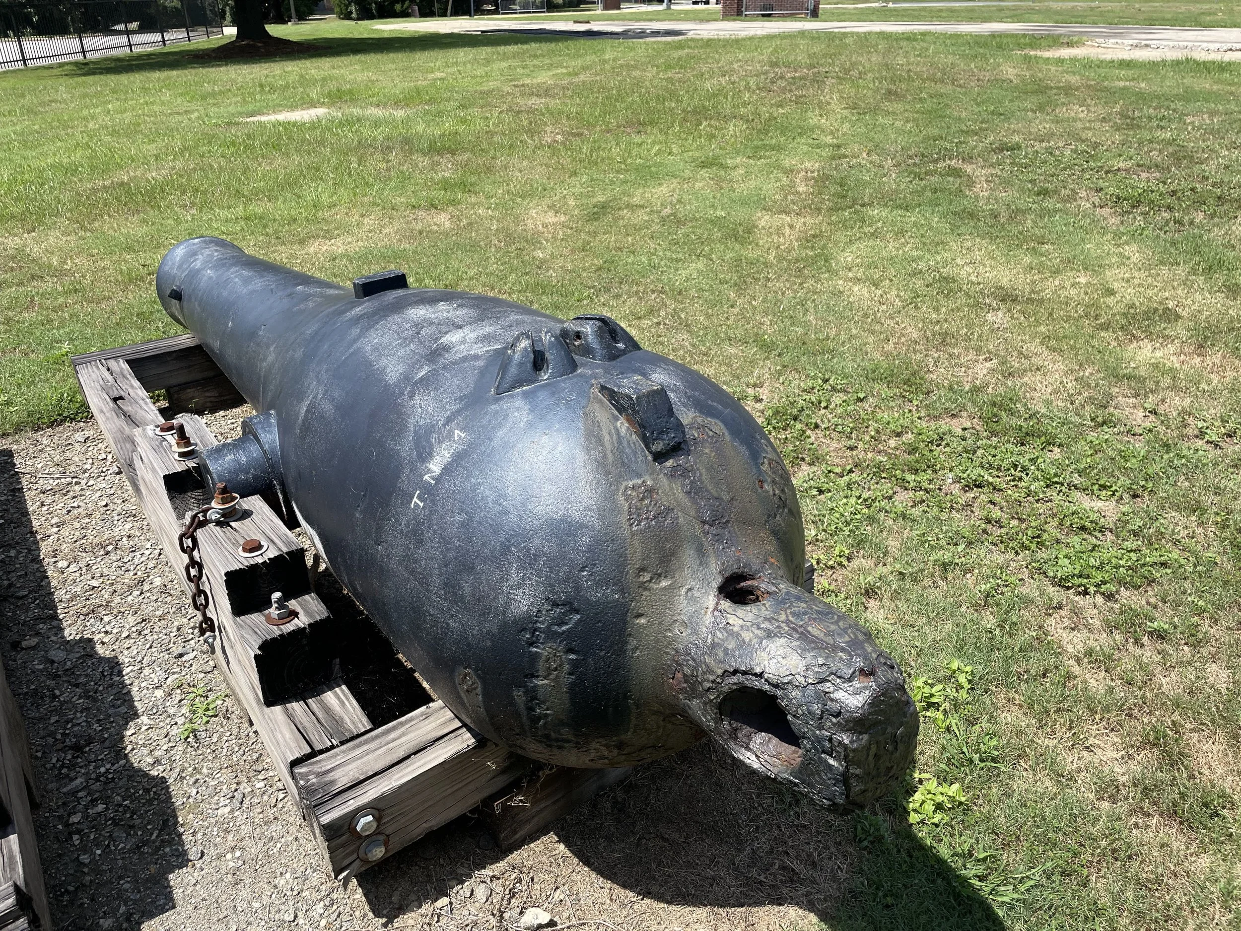 At first glance the registry number appears to be “84”, but “34” is correct.  Note the deterioration at the cascabel caused by a century in concrete.