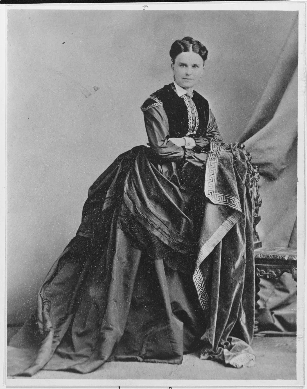 Virginia Loyall Farragut, wife of David Farragut, standing in an elaborate dress of the 1860s
