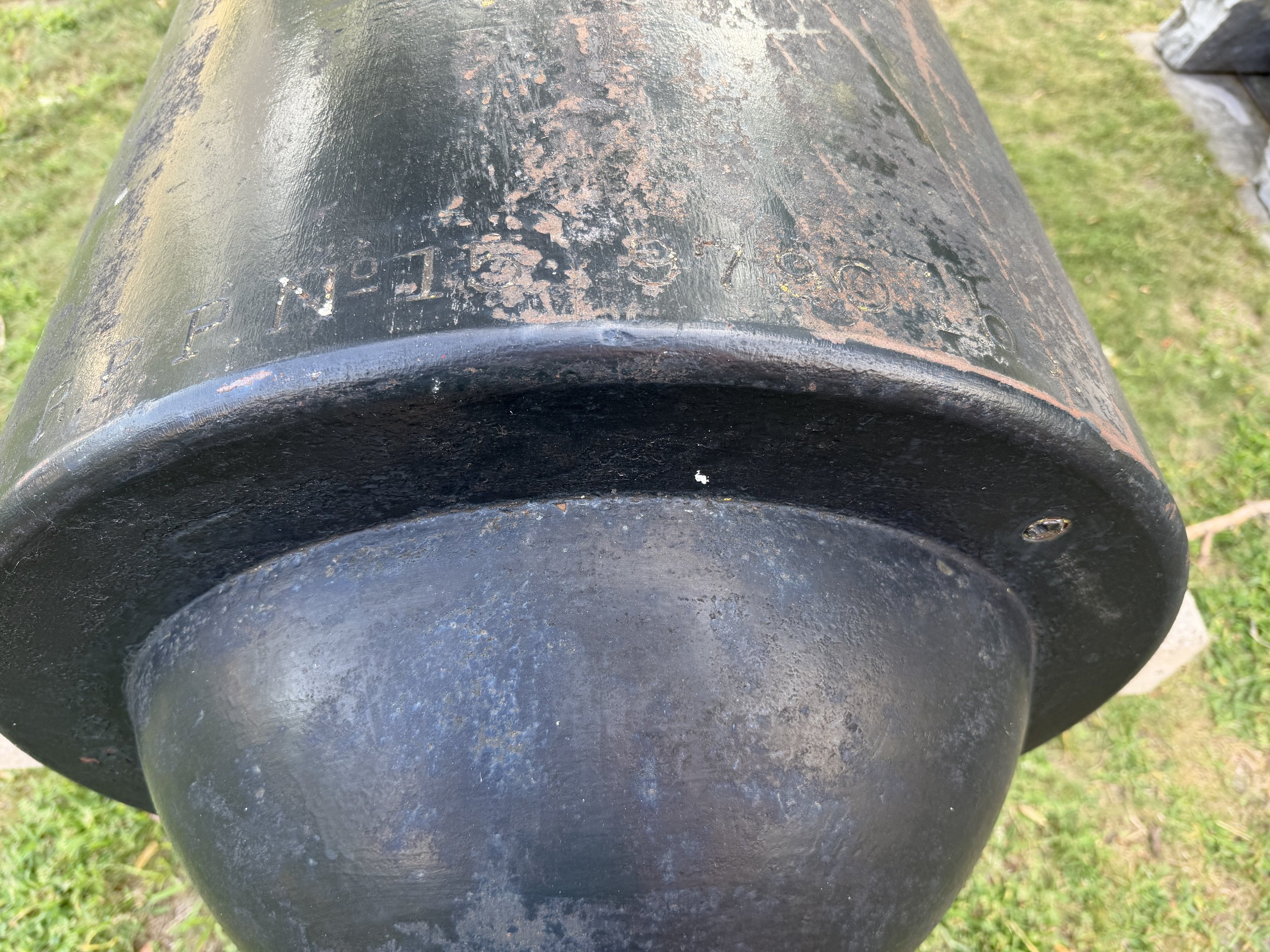 Breech of US Navy 100-Pounder Parrott Rifle Number 15.  Weight is shown as 9,790 pounds.