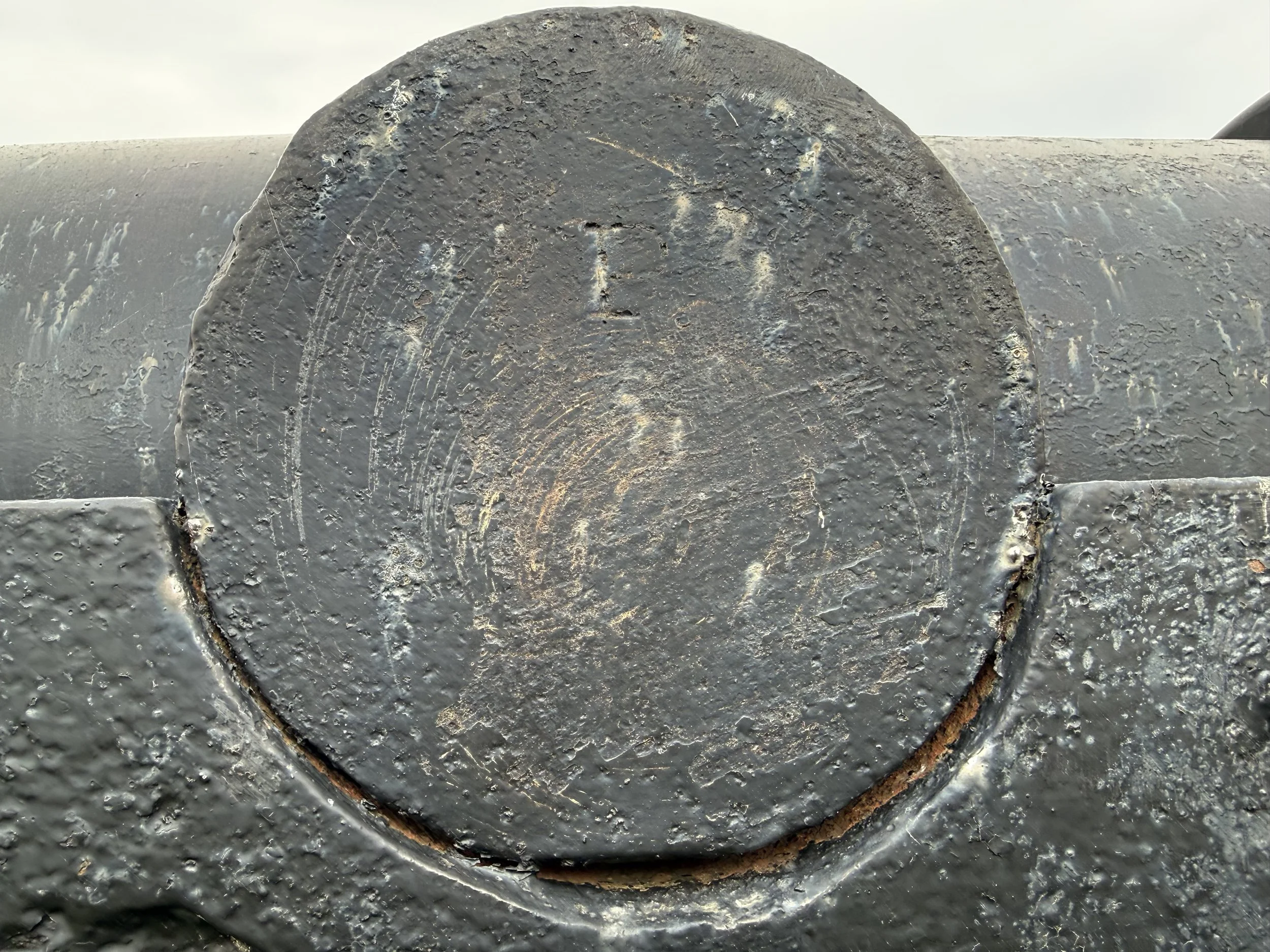 Trunnion of Number 10 showing the Navy “P” of a proofed gun