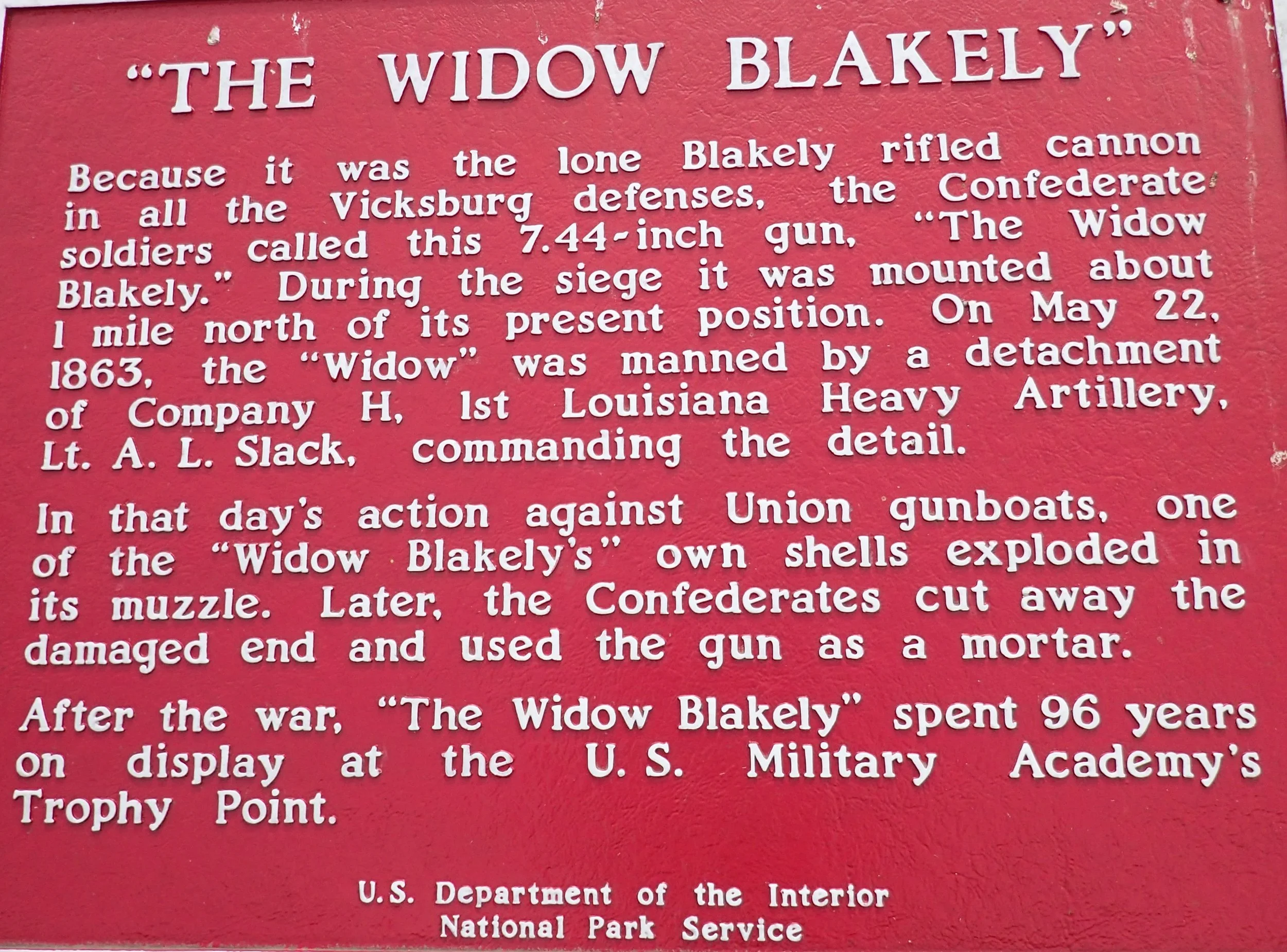 Interpretive plaque beside the Blakely.    Describes how the gun was damaged on May 22nd, 1863.