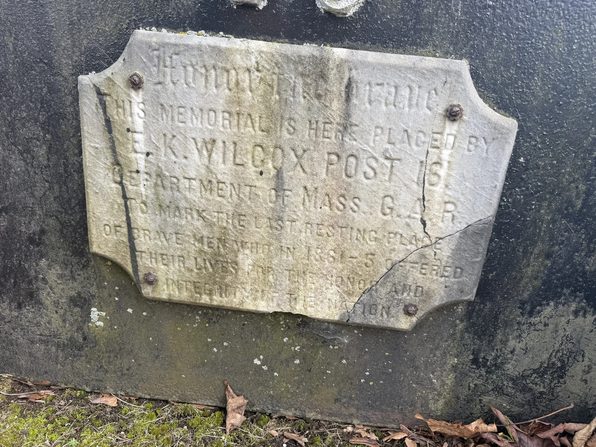 A dedication plaque from the E.K. Wilcox Post 16 of the G.A.R. is placed on the rear of the carriage.