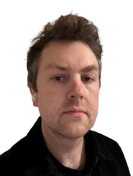 A man with light brown hair and stubble