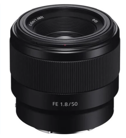 A black camera lens with a wide aperture of f/1.8 and a 50mm focal length, featuring textured grip rings.