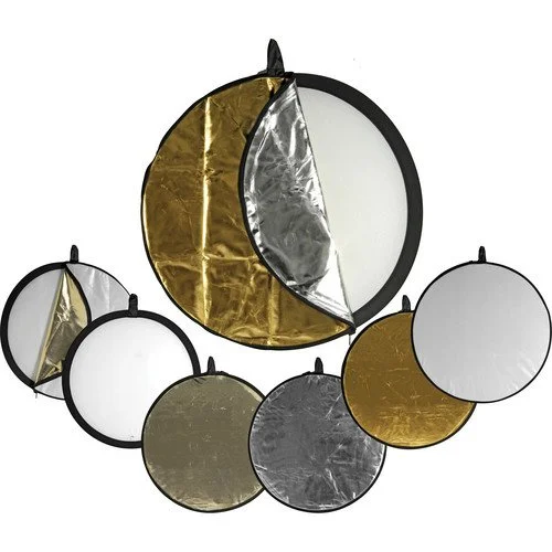 Decorative moon and globe wall mirrors with gold, silver, black, and white accents.