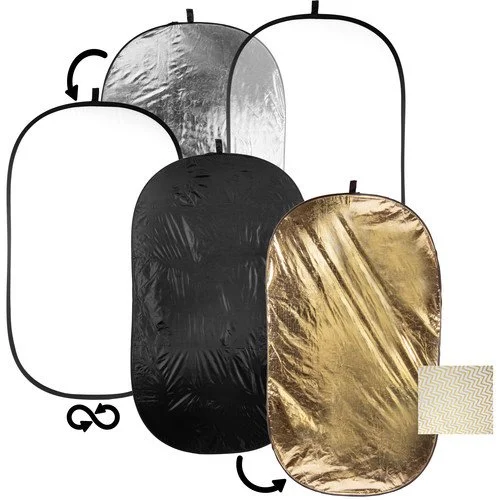 Set of collapsible reflector diffusers in silver, black, and gold with hooks for hanging.