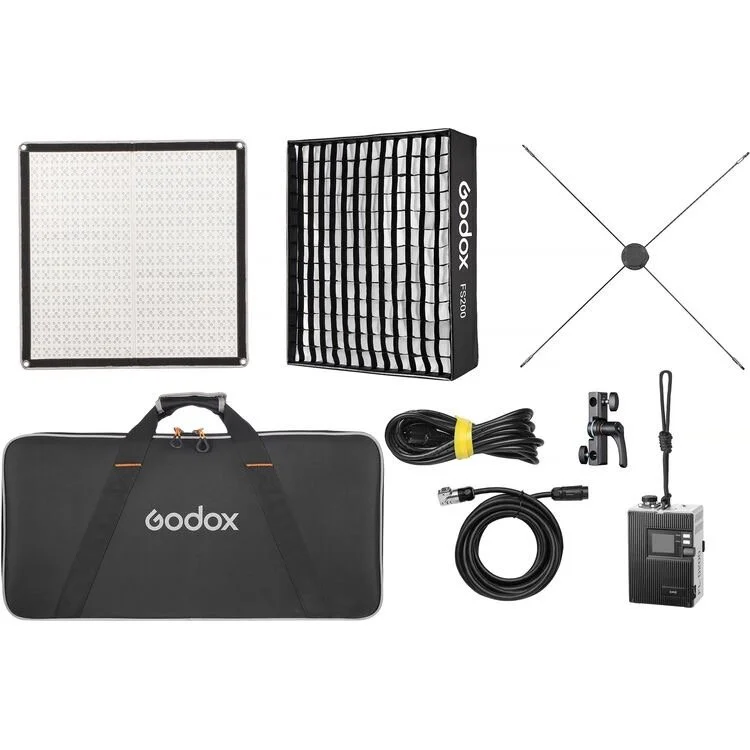 Photography lighting kit including a square LED light panel, an octagonal ring light, a softbox, a carrying case, cable cords, a microphone, a small tripod, and a wireless microphone system.