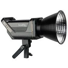 A professional studio flash or strobe light with a reflector and mounting stand.