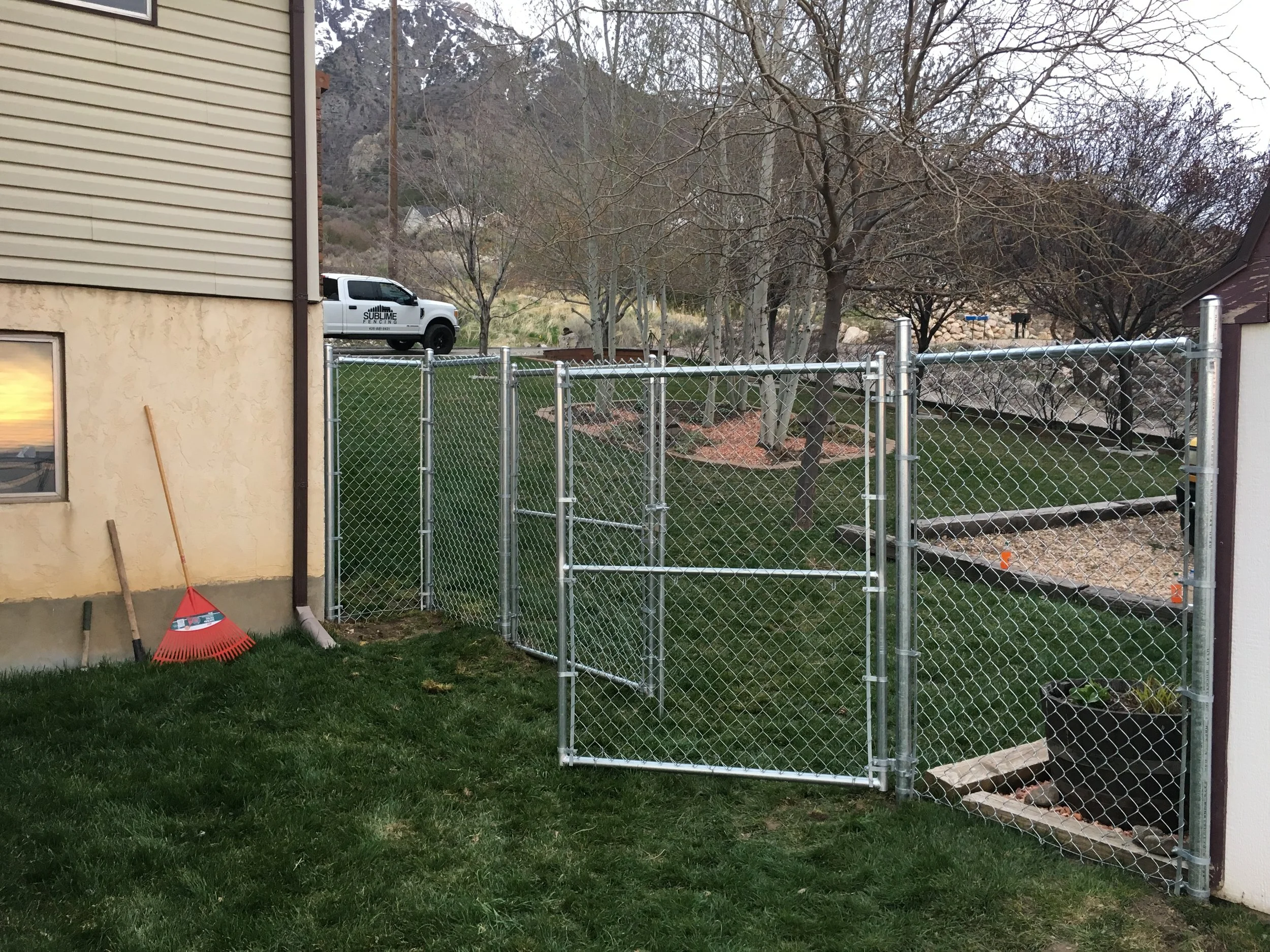 Chain-Link fence and gate on a residential property.
