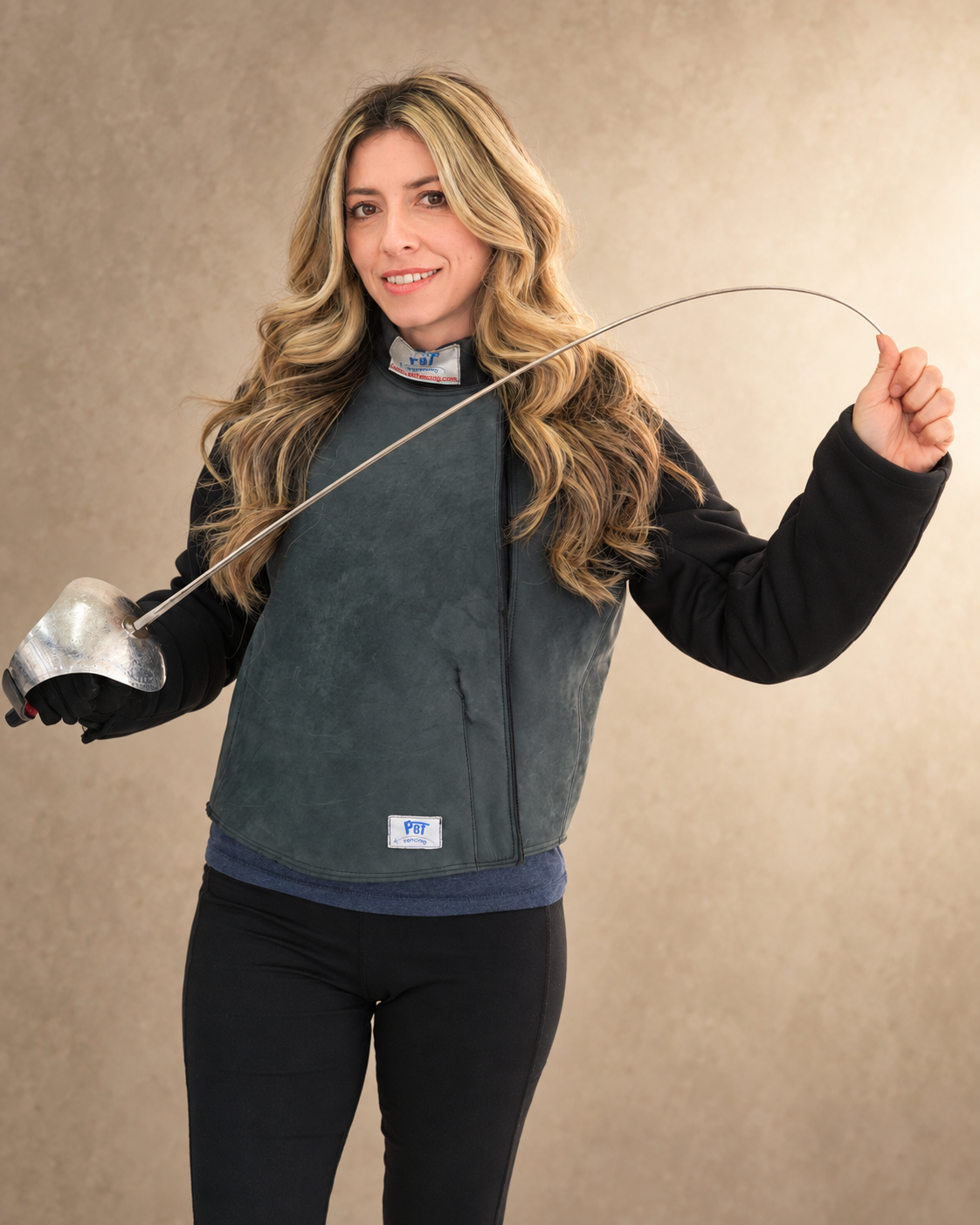 Tsvetelina Hristov in fencing lame holding a saber
