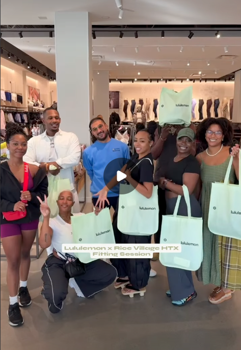 Group of people at Lululemon store holding Lululemon shopping bags during a fitting session.