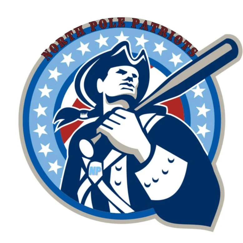 Illustration of a North Pole Patriot mascot holding a baseball bat, wearing a colonial-style hat and uniform, with a circular background of stars and red, white, and blue colors.