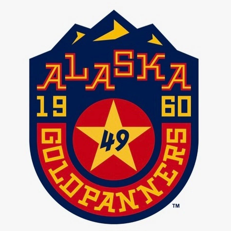 Alaska Fire Department emblem with a mountain, a star, and the numbers 49, 19, 60, and 50.