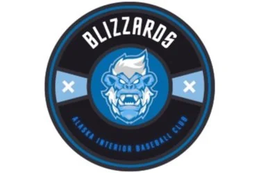 Blizzard Alaska Interior Baseball Club logo featuring a blue lion's head with white hair, surrounded by a black circle with blue and white details.
