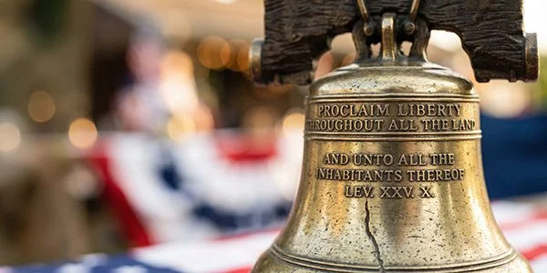 Liberty Bell and red, white, and blue bunting