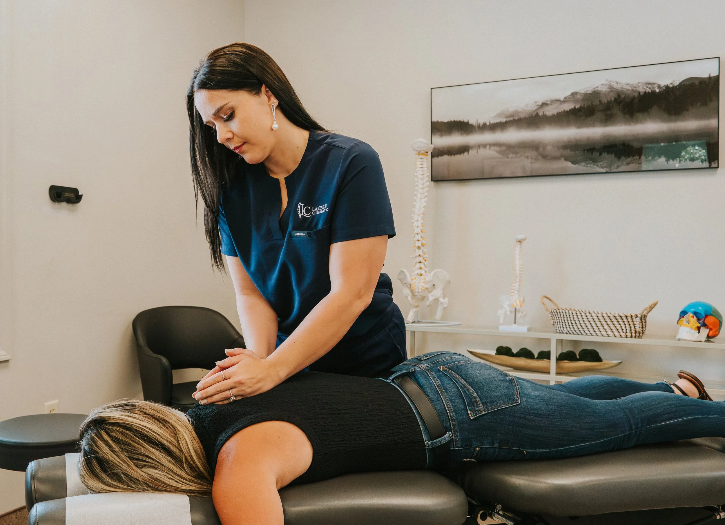 Dr. Smith working on a female patient in a patient room