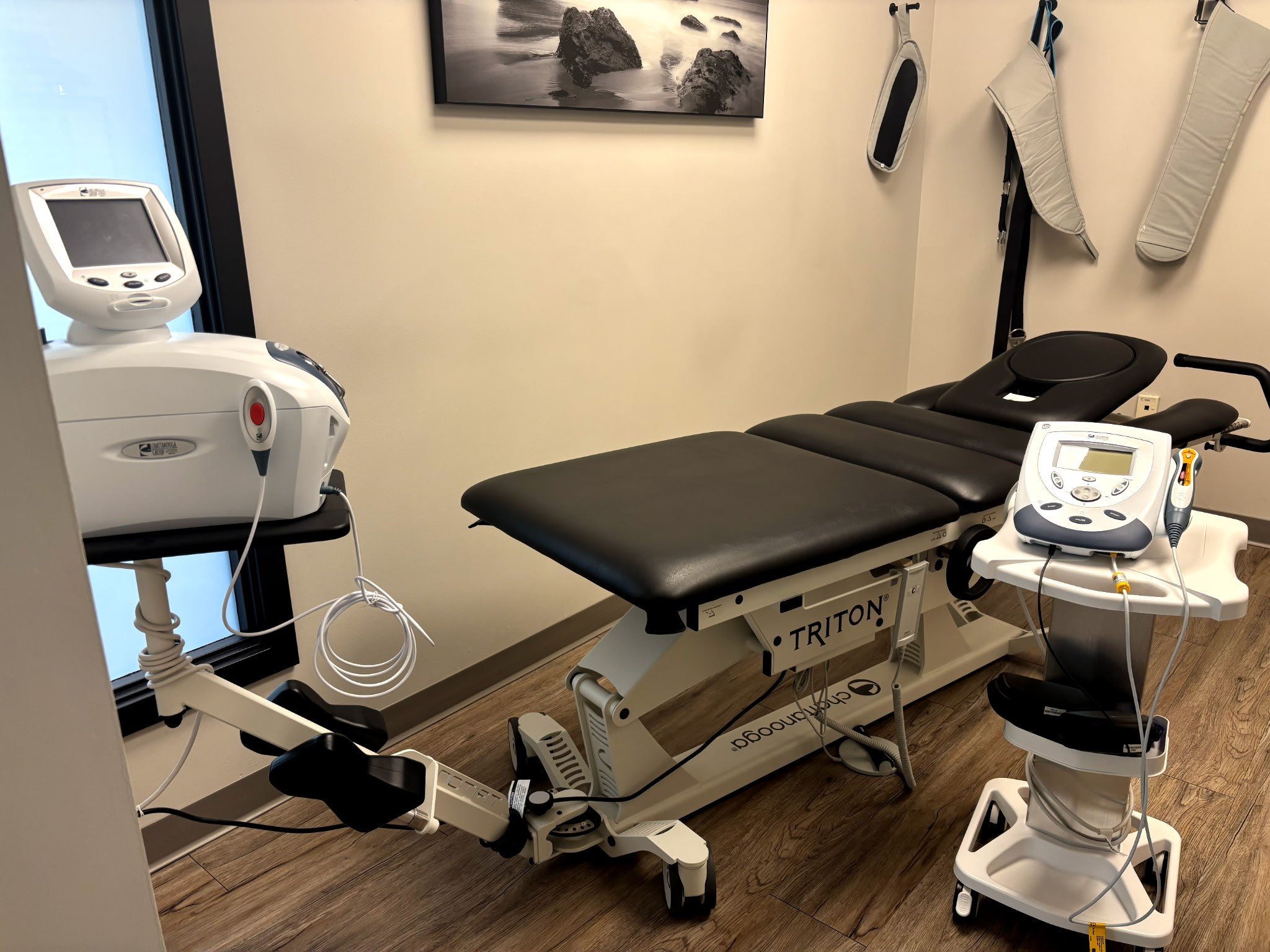 treatment equipment and a chiropractic table in a treatment room