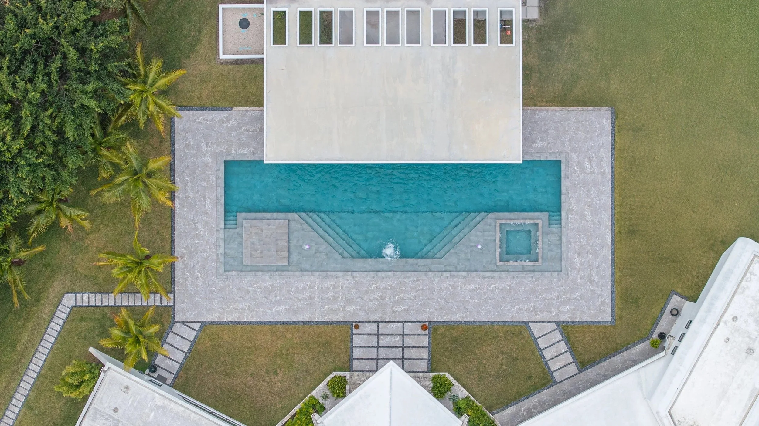 broward-luxury-pool-coping-blue-stone-modern-home-31.jpg