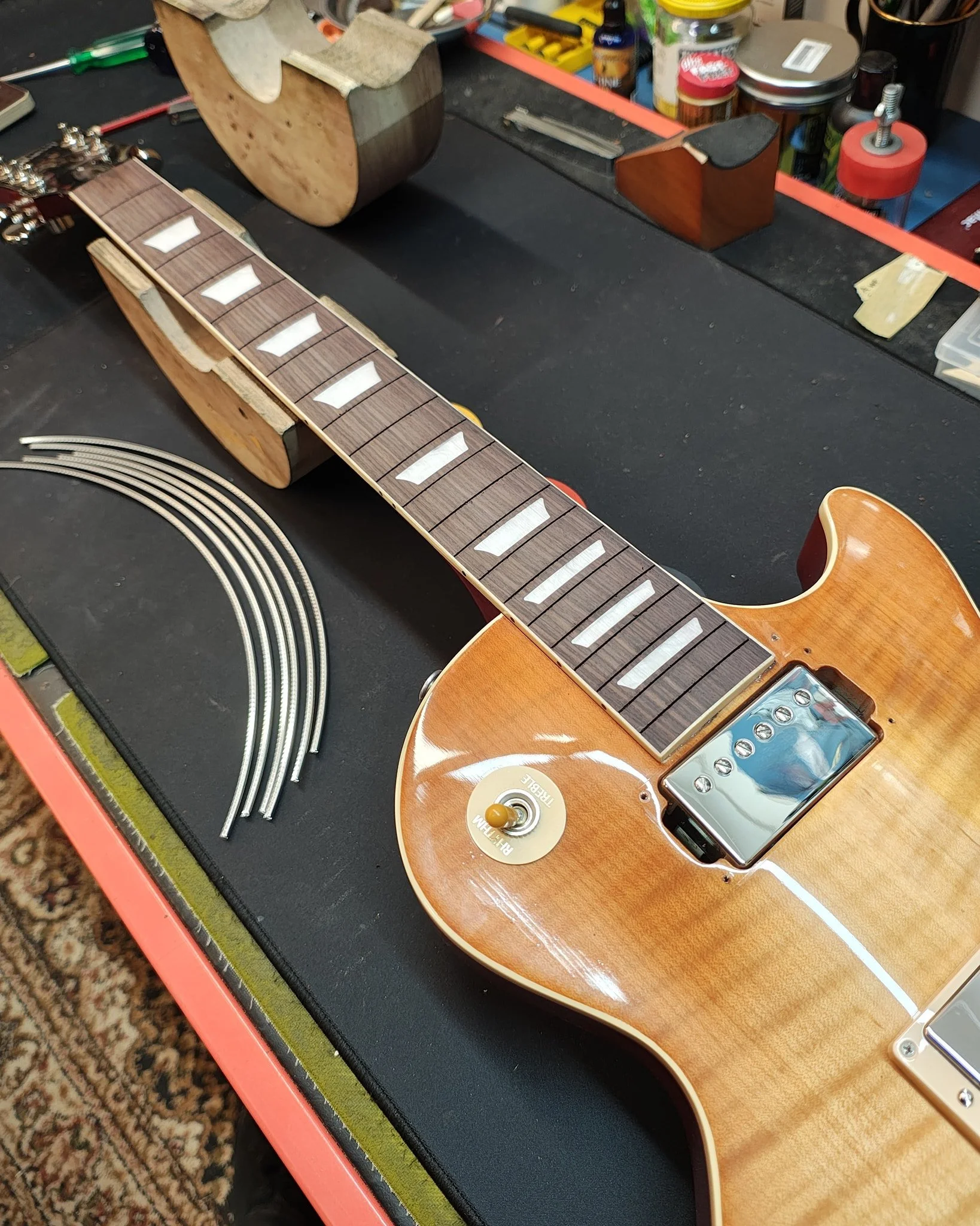 Too busy Ive forgotten to take photos. About to chuck some stainless frets in this brand spanker Les Paul..and a random photo of my 4 legged apprentice attacking our small mulberry tree #axewoodguitarworks #refret #guitarservice #guitarrepair