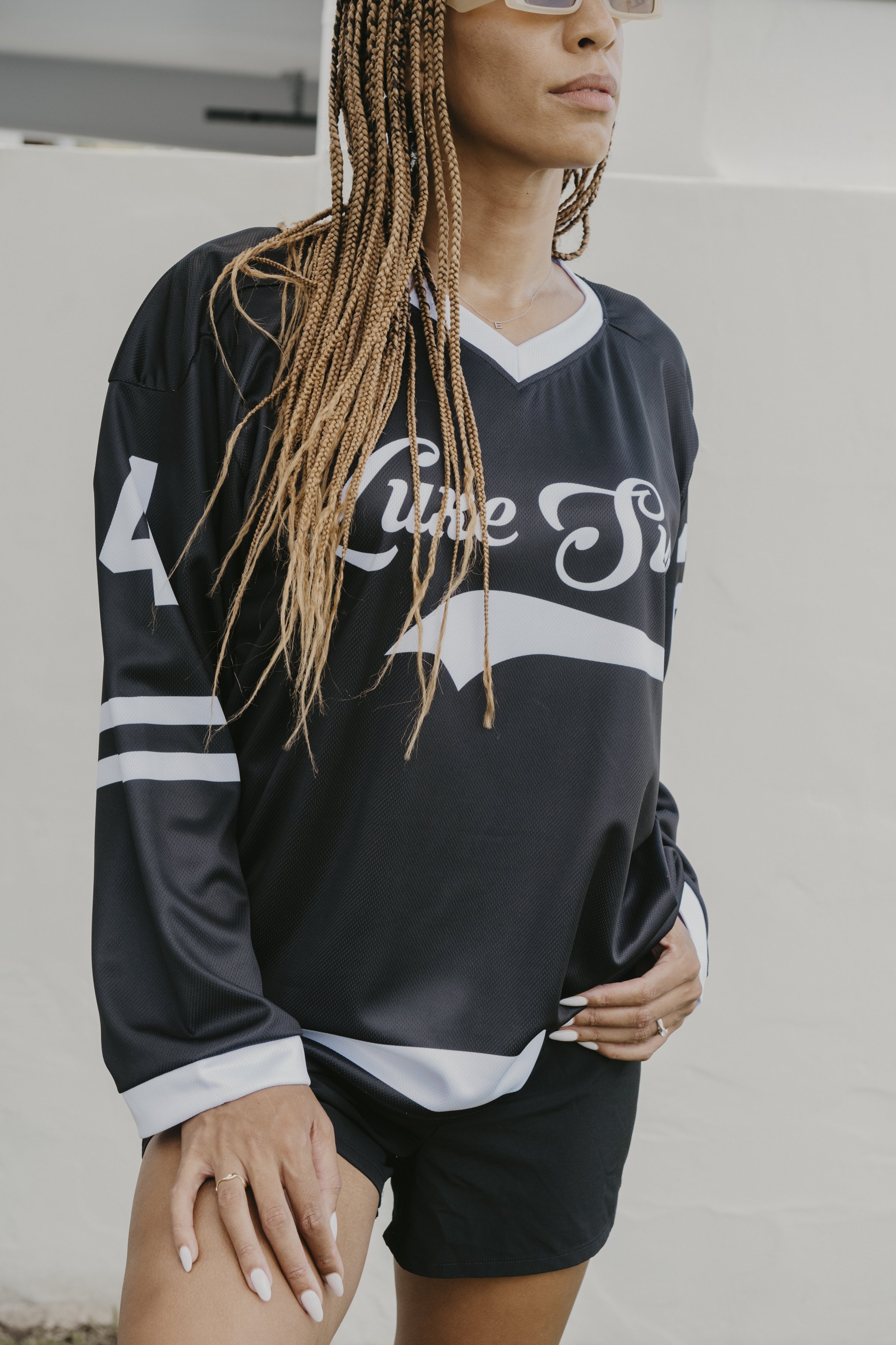 Woman in black Luxe Sun Jersey