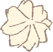 A light-colored leaf with visible veins and a jagged edge.