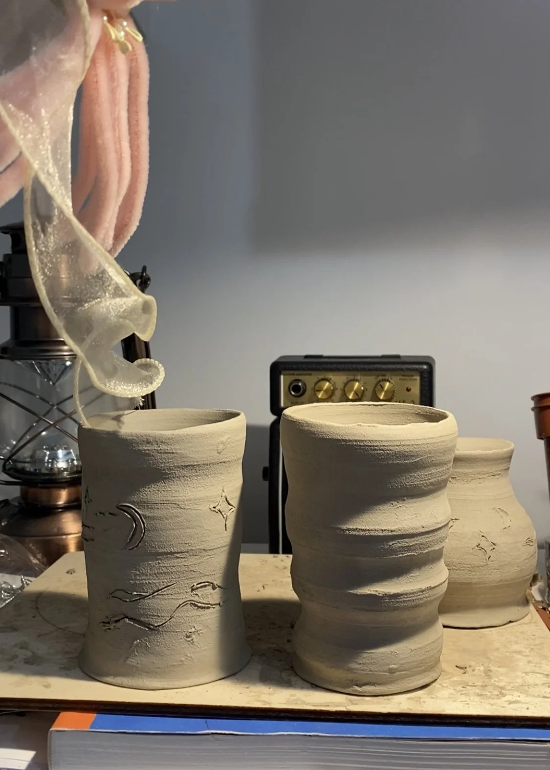 Small mugs inspired by cosmic elements.