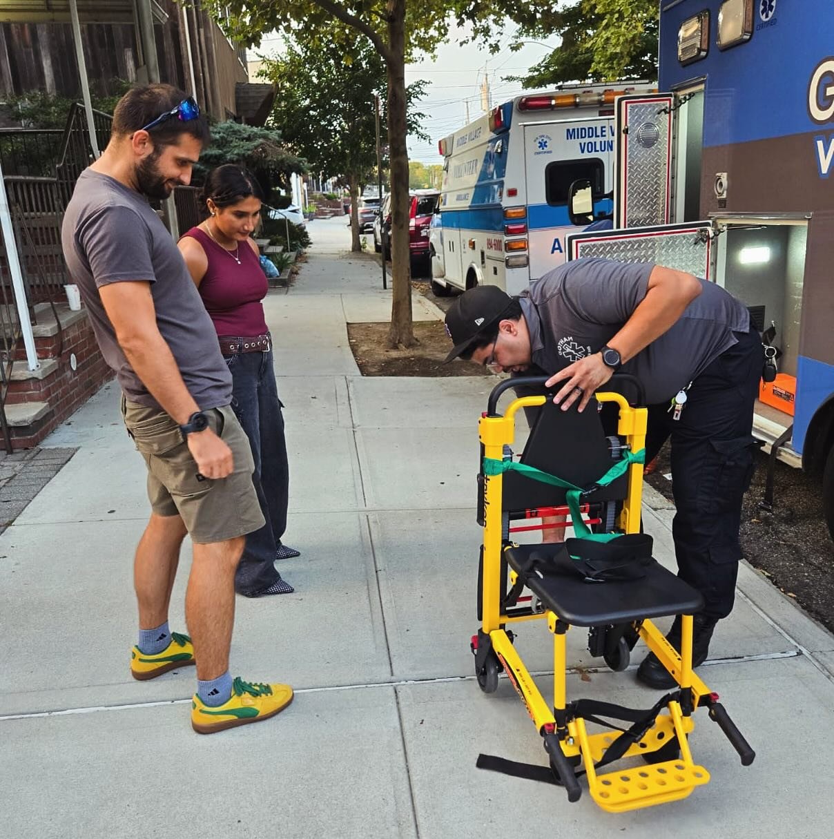 Abraham is showing our new volunteers how to use our big, beautiful stair chair!