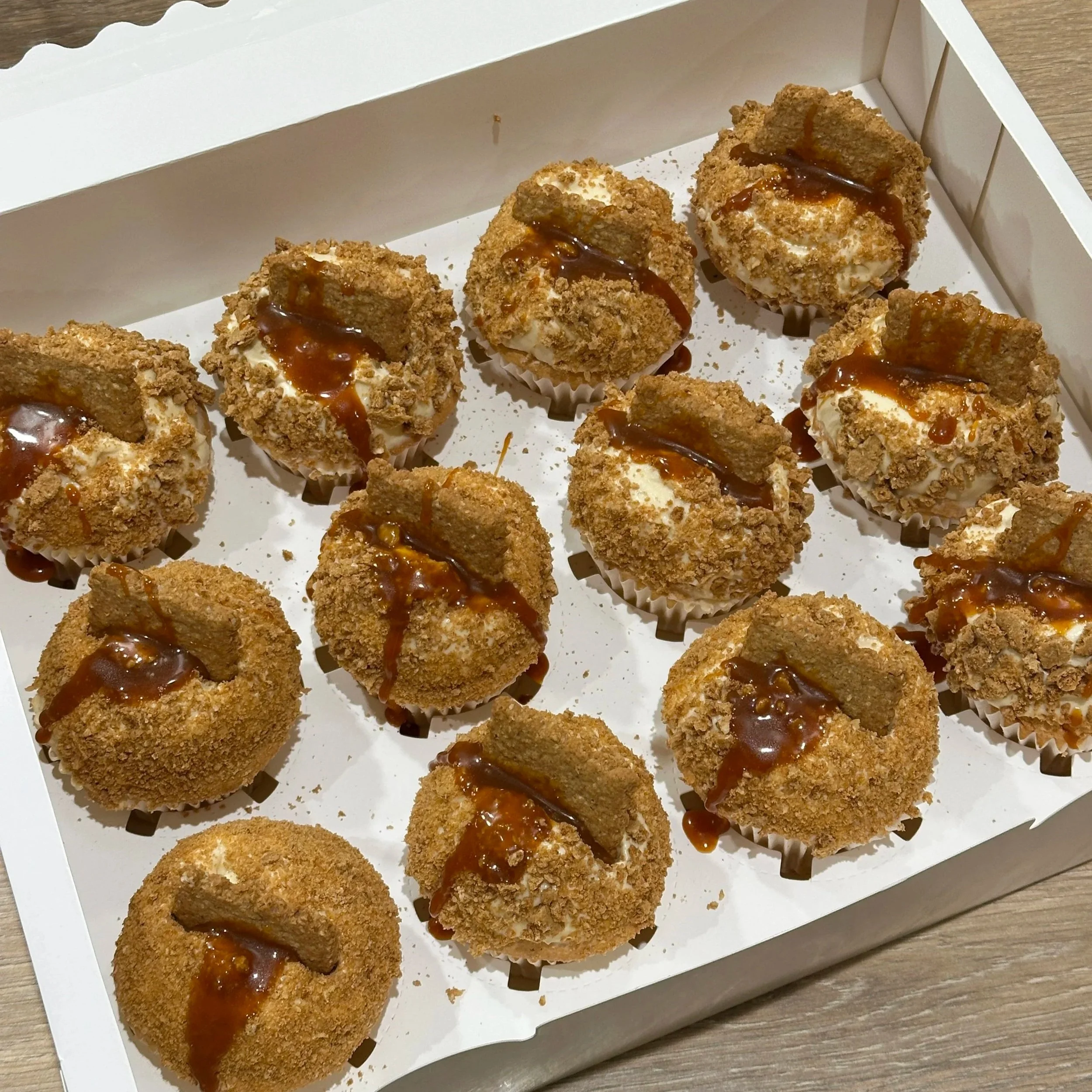 12 Caramel Biscuit Cupcakes - £30