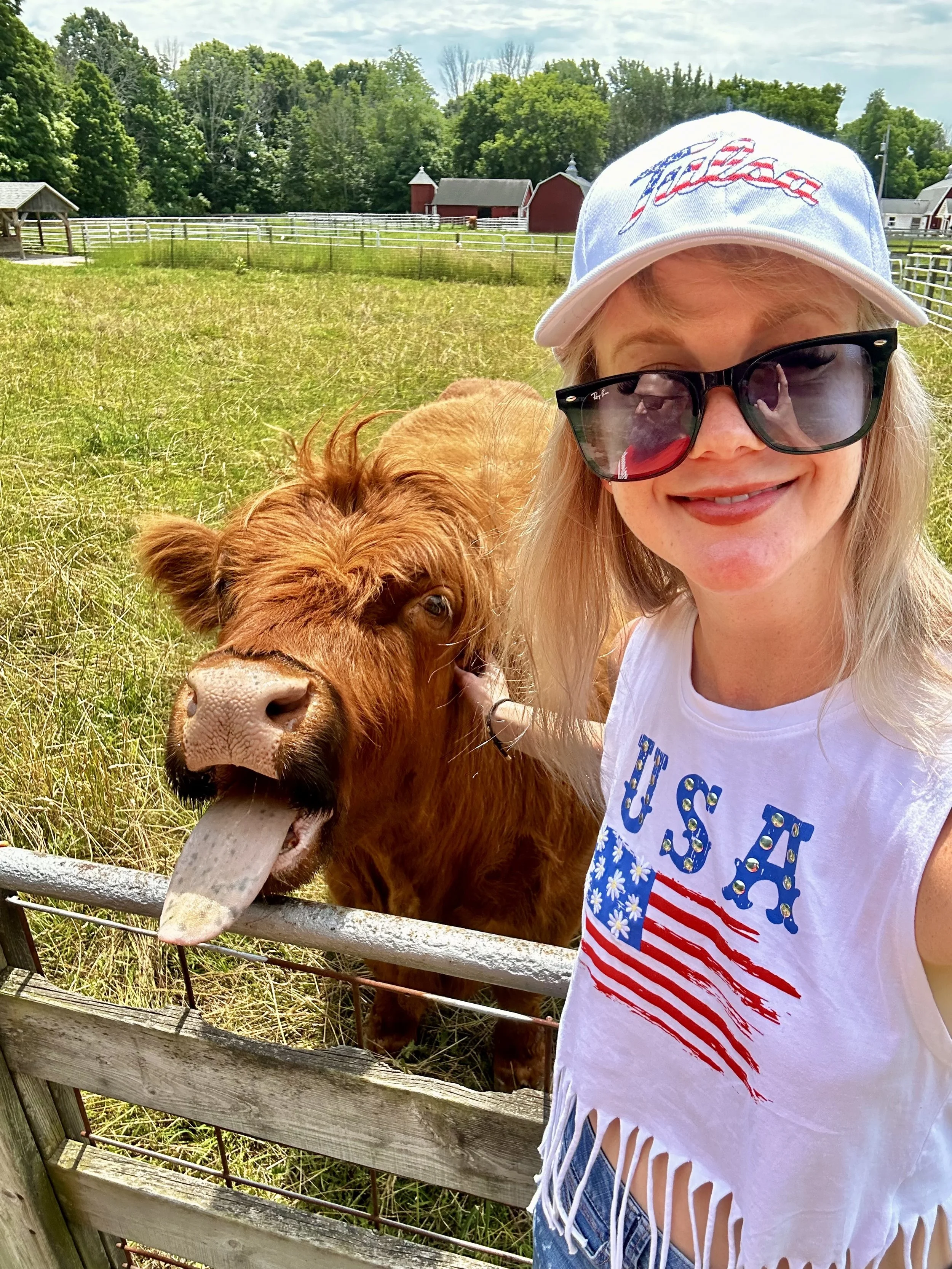 Woman and cow at The Farm in Door County
