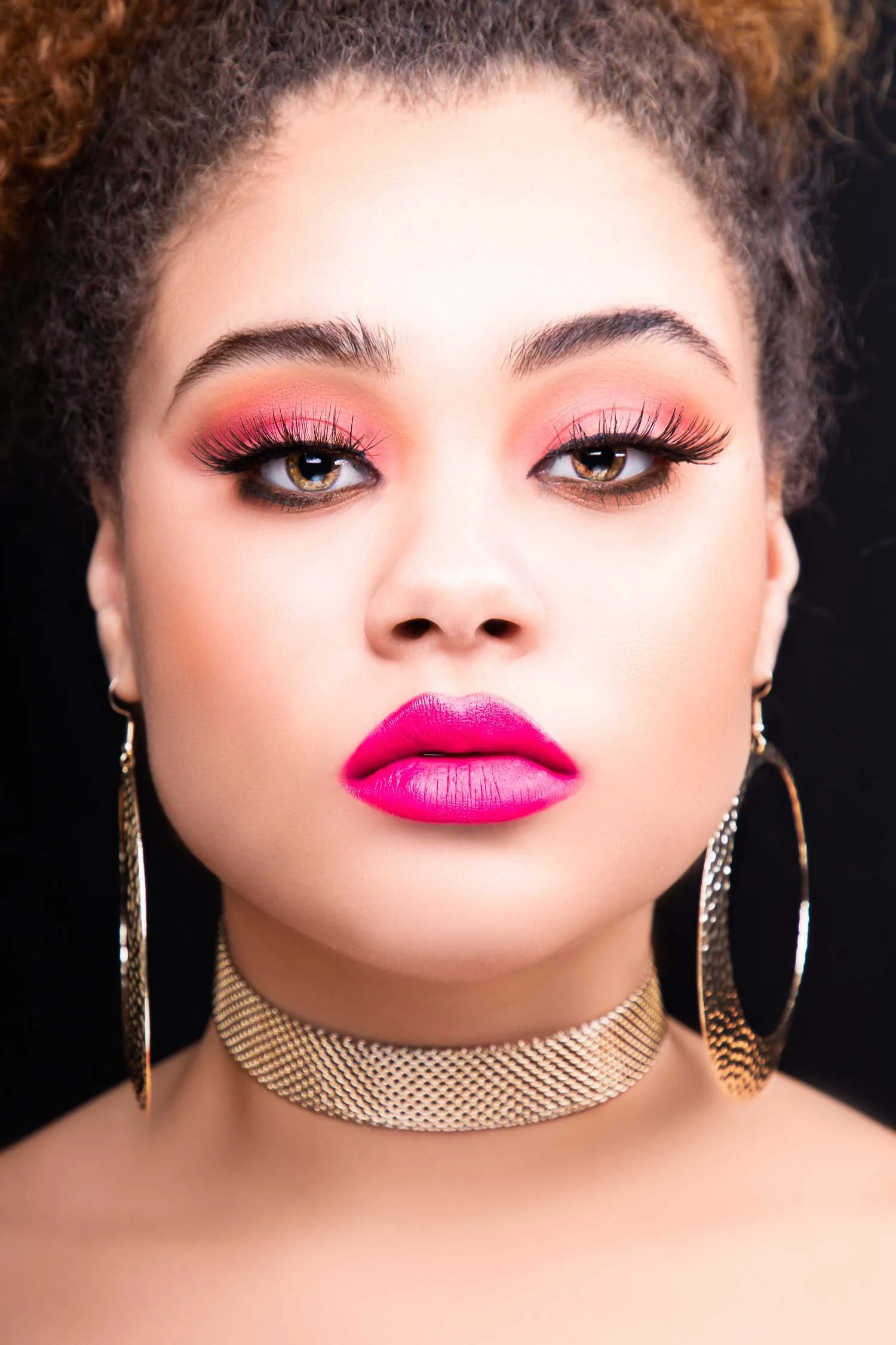 Beauty headshot of a female model with soft lighting and a confident expression photographed by a Tampa headshot photographer, JMC Innovations.