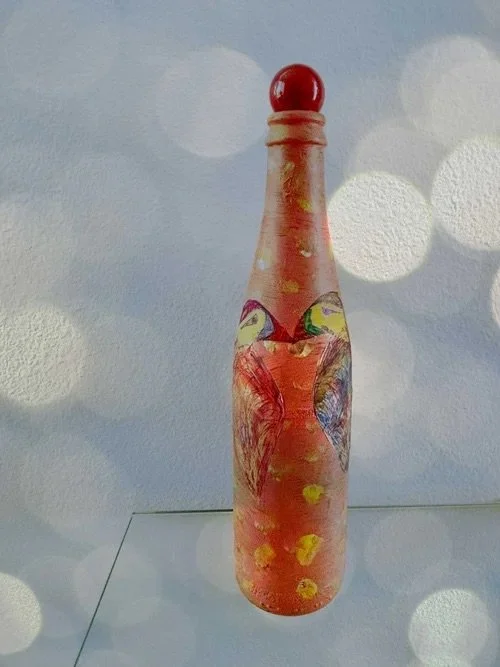 orange-bottle-with-two-birds-arwork.jpeg