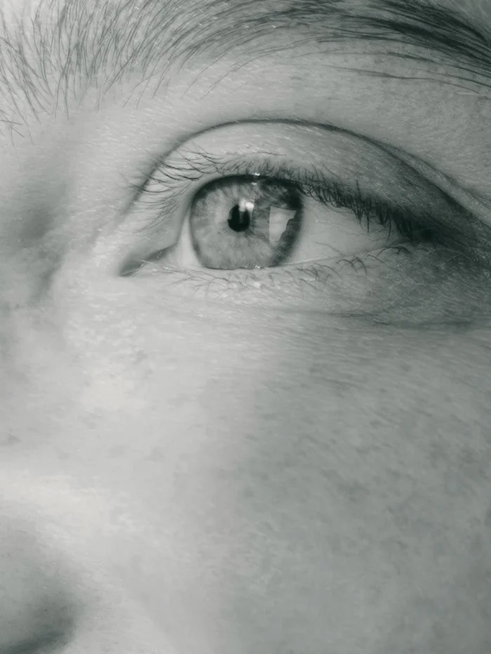 A nurse measuring the pressure of a woman